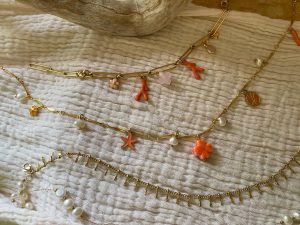 Collier orange breloques acier inoxydable